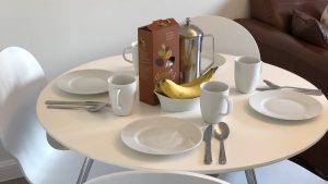 Dining table set for breakfast at Rock Lobster holiday cottage